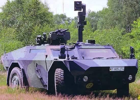 Armored surveillance vehicle with a mast-mounted camera
