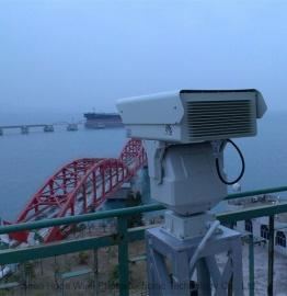 Long-range camera on a bridge at a border crossing
